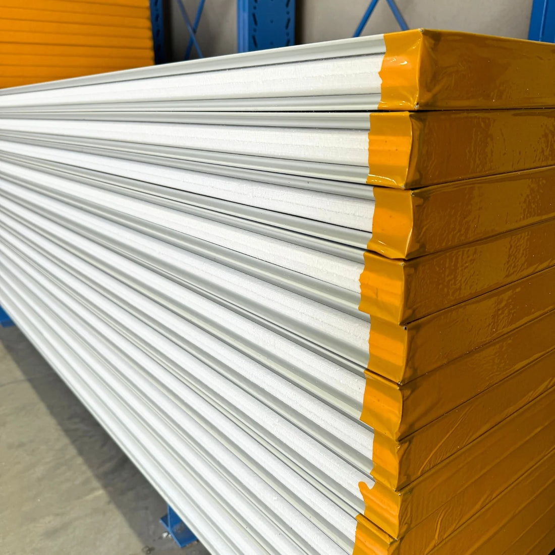 Stacked EPS Coolroom Panels featuring 50mm thickness, showcasing their lightweight and durable design for superior insulation and energy efficiency.